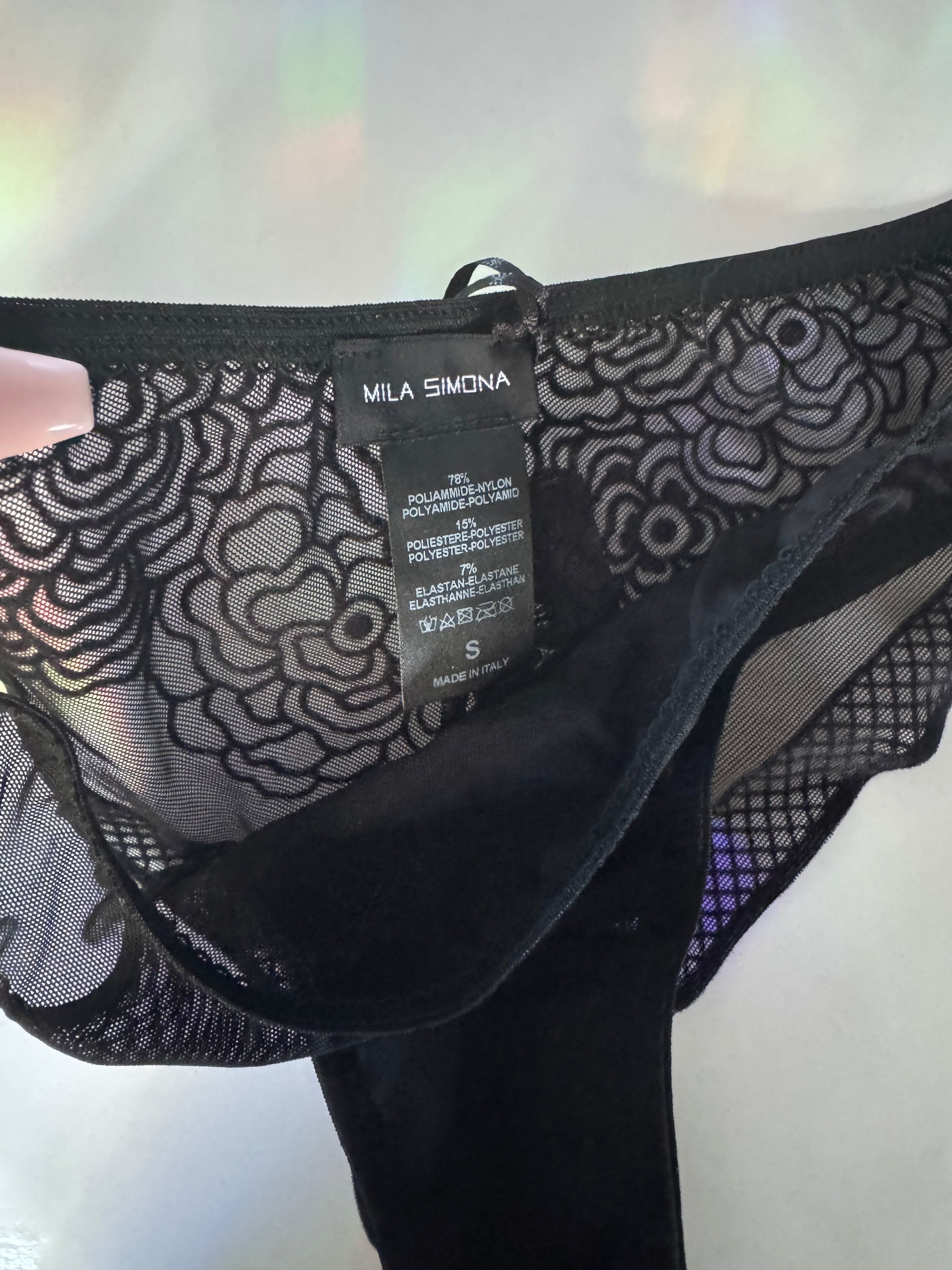 Photo of the velvet peony design on the black mesh brief 