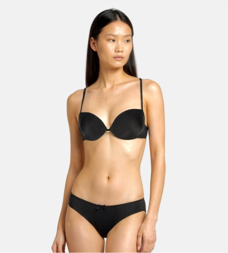Model wears black bra and black brief 